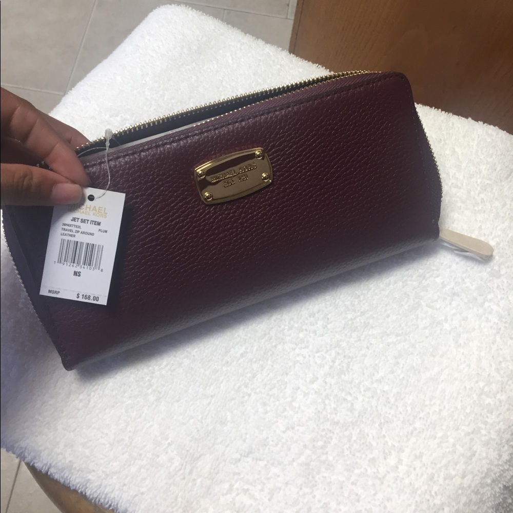 NWT Michaels Kors Plum leather wallet